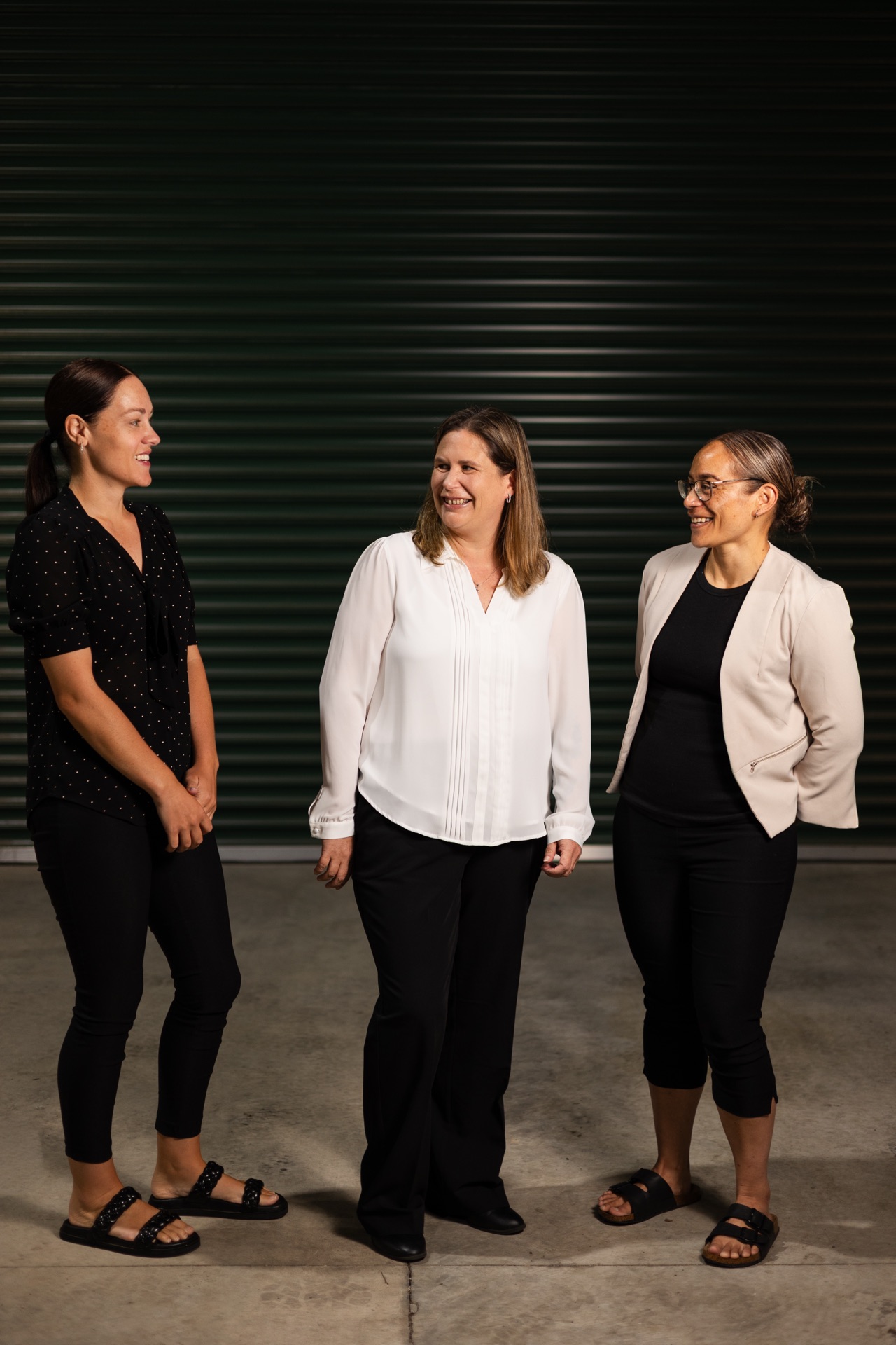 Chelsea, Cherry, and Veronica from TACA walking together